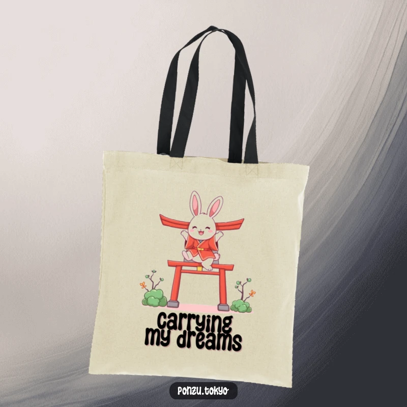 Funny bunny in a red kimono joyfully leaping over a stylized torii gate design on a tote bag.